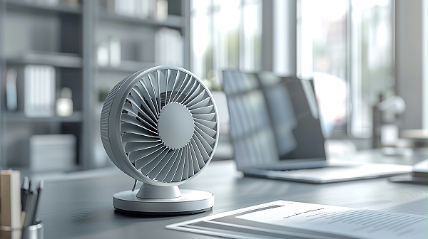 千庫網(wǎng)_夏天辦公桌上的小風(fēng)扇照片_攝影圖編號20641408